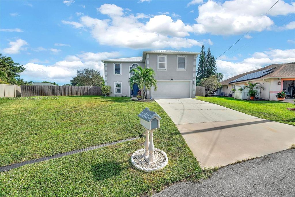 Photo of 196 SW Nina Ct, Port Saint Lucie, FL 34953 (MLS # A11692869)