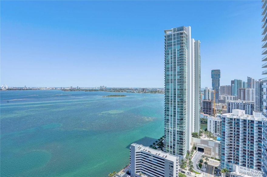 Take a peak of the magnificent open bay and lively city views from this modernly furnished unit in the sky. This 2 Bedroom 3 Full Bath fully furnished condo has been professionally designed and decorated with over $200,000.00 in great innovations. From recessed lights, electric blinds, black waterfall kitchen counters, this is one of the only places around you will feel at home. Sunrises and sunsets are a sight to see from the 33rd floor. Amenities include tennis courts, gym, sauna, massage room, movie room, pool room, children area, and much more. Call me today to learn more.