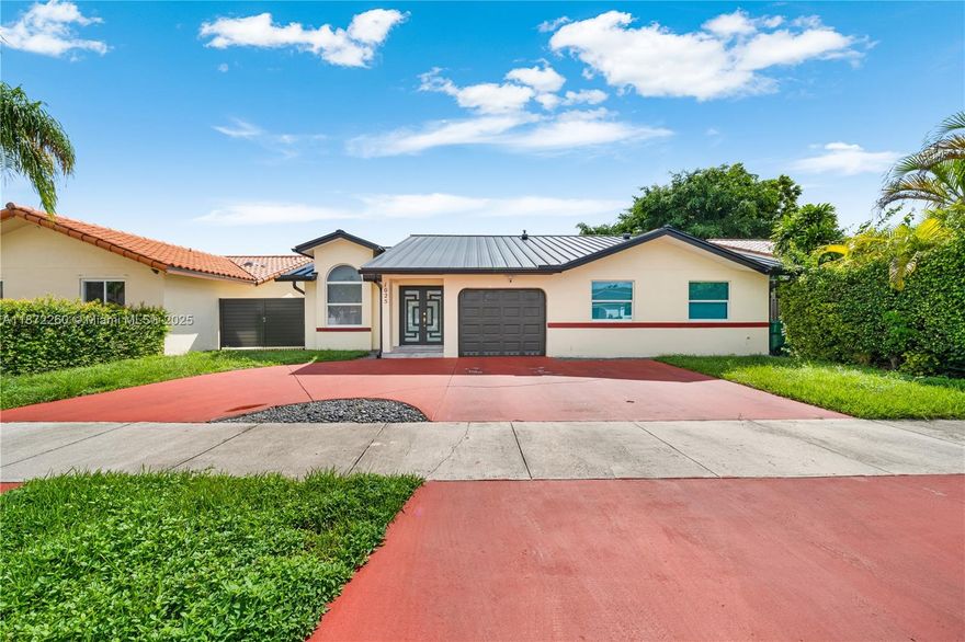 Your dream home awaits! This fully remodeled, smart, and modern 4-bed, 2-bath home with an extra 5th room (office/gym) is located in the sought-after Shoma Homes area—no HOA! Enjoy a chef’s kitchen with quartz countertops, new appliances, and custom closets throughout. Luxurious bathrooms feature glass showers, LED mirrors, and a hydromassage tub in the master. The climate-controlled garage doubles as a 4K home theater with 5.1 surround immersive sound system—perfect for family movie nights or showcasing your collector car. Smart home tech lets you control lights, A/C, and cameras by voice. Outside, relax in your tiki-style patio kitchen and jacuzzi. New metal roof (2025), impact windows/doors, LED lighting and newer A/C keep your home insurance and energy bills low.