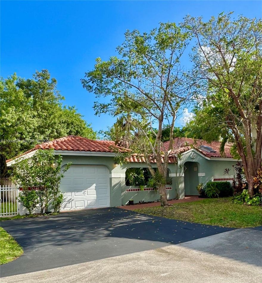 GREAT OPPORTUNITY to live in this desirable home/location in Weston, FL - Price Reduced - Responsive Seller- show and call agent ! Perfectly situated in one of Weston's most sought-after family neighborhoods in this price range! Home remodeled in 2007 with great upgrades,tile roof, kitchen, beautiful marble kitchen counters & large island w/sink and cooktop, storage plus! A chance to still add your own special touches makes this an incredible value priced below market. Open concept plan for entertaining! 
Home has one of the largest backyards in the entire subdivision, backing up to tranquil park-like setting with no neighbors/ homes behind. Room for a pool! Great home for families, down-sizing couples, maintenance free lifestyle.  This 'zero-lot line' HOA subdiv. is maintained by assoc. - low fees. 
No short term rentals, annual rentals allowed. Sold As-is.