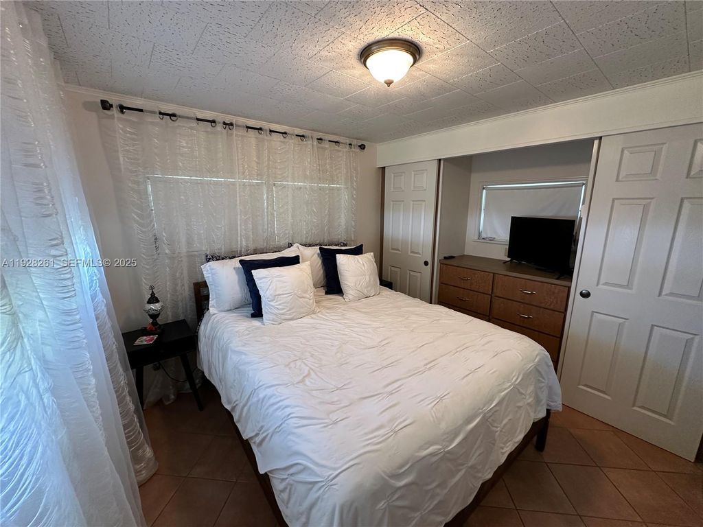 Photo of 573 NE 47ct, Deerfield Beach, FL 33064 (MLS # A11928261)