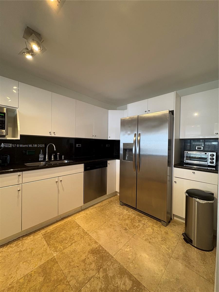 This beautifully updated residence offers 1042 sq ft of light-filled living space, featuring a spacious 1-bedroom plus den layout. Set directly on the ocean, it provides private beach access and sweeping sea views from your own balcony—ideal for morning coffee or evening relaxation.
Inside, the home is fully furnished and equipped, including a brand-new kitchen with modern appliances and sleek cabinetry, as well as an in-unit washer and dryer. The primary bedroom boasts an ample walk-in closet, while the versatile den can serve as an office or guest room.
One assigned parking space, valet service, and complimentary beach chairs and umbrellas. If you’re looking for turnkey coastal living with comfort, style and direct oceanfront access, this property delivers it all.