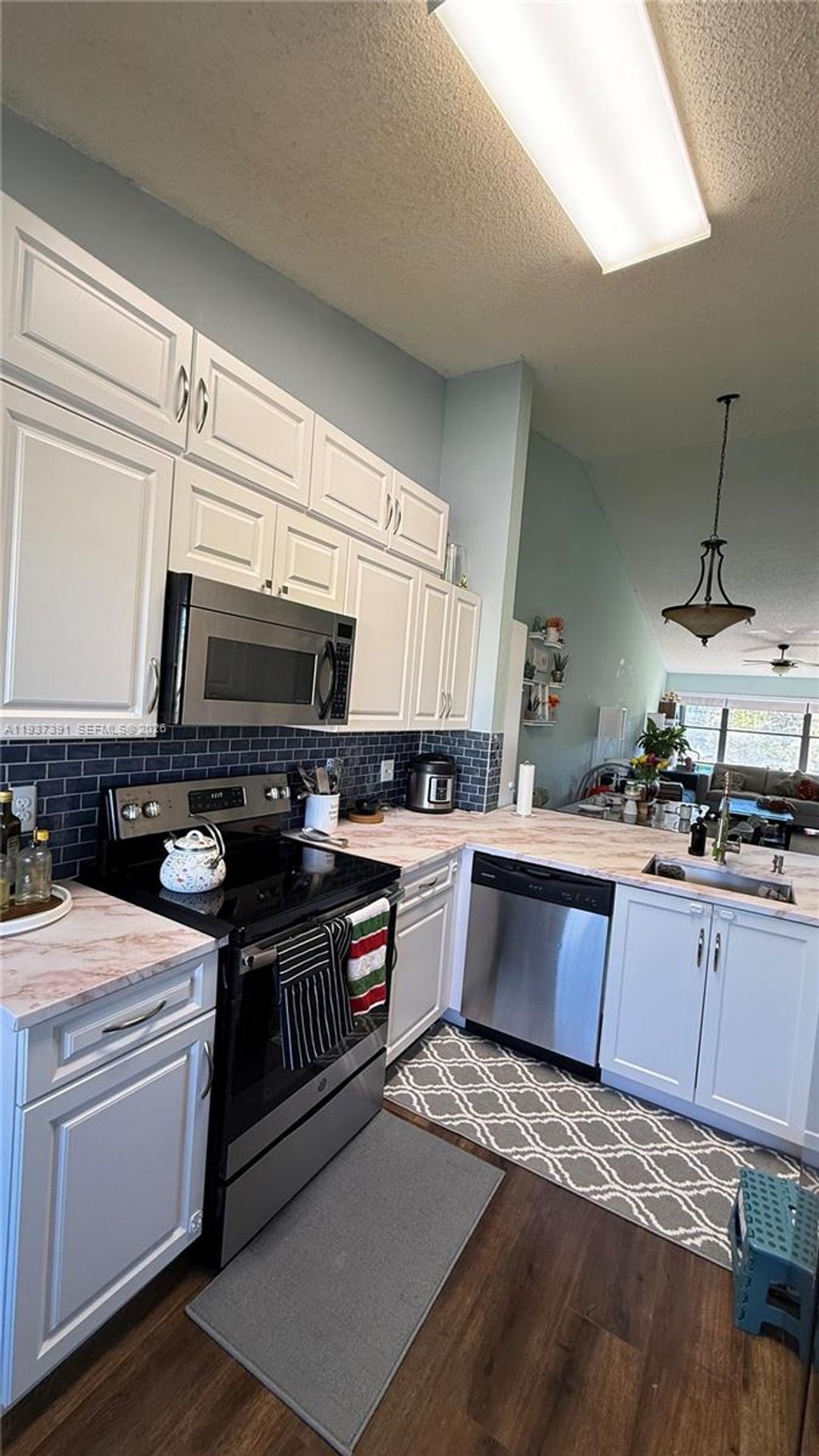 Photo of 4712 E Lucerne Lakes Blvd E #202, Lake Worth, FL 33467 (MLS # A11937391)