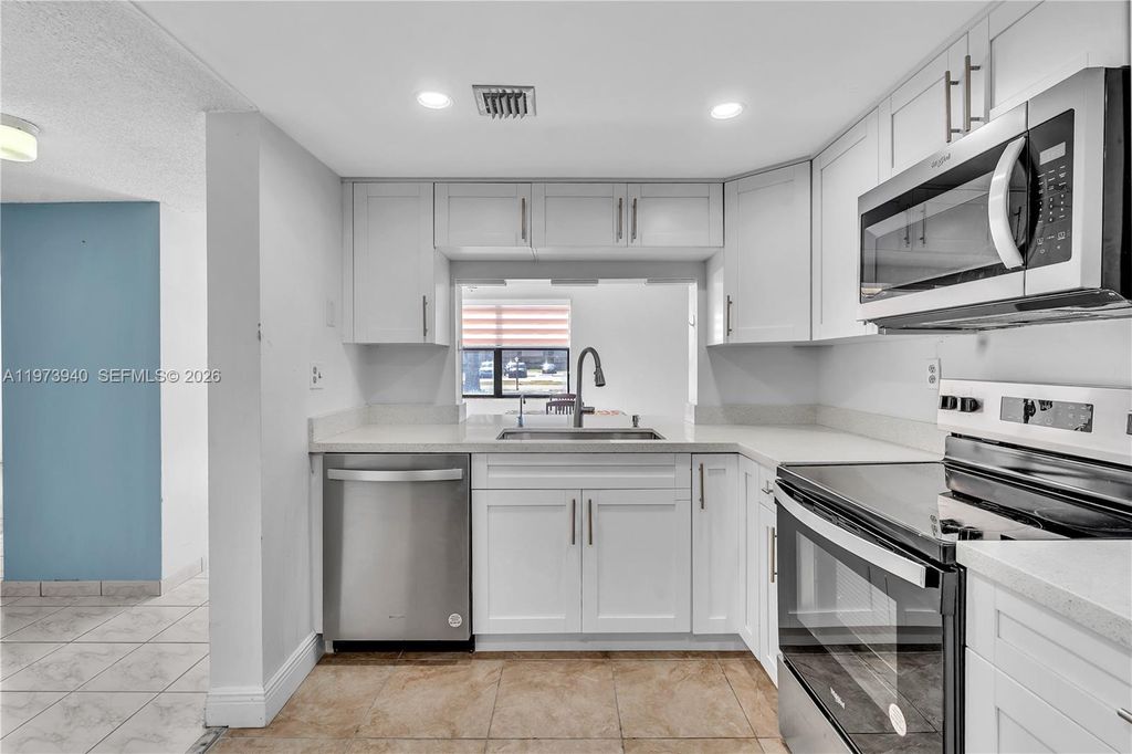 Photo of 3252 Foxcroft Rd #102, Miramar, FL 33025 (MLS # A11973940)