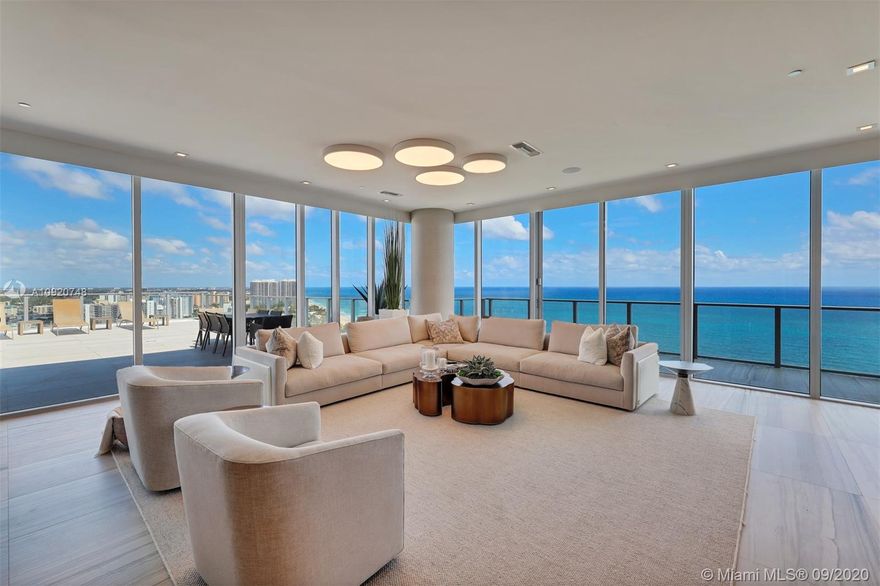 As you step off your elevator into your exclusive entry you are surrounded by an oasis of high end luxury and astounding jaw dropping views. Interiors by Steven G showcases "organic elegance on the ocean". The simplicity of its clean lines and neutral fabrics welcomes you to an environment of pure haven overlooking the ocean. Italian Porcelain tile throughout leading out to an expansive 4,100 Sf terrace with plunge pool. Custom soft toned walnut millwork is the elegant back drop for the tailored imported Italian furniture throughout the space in soft linen textured fabrics and organic elements. There is no end to the luxury shown in this residence and custom craftmanship, closets and features throughout this magnificence home in the sky.