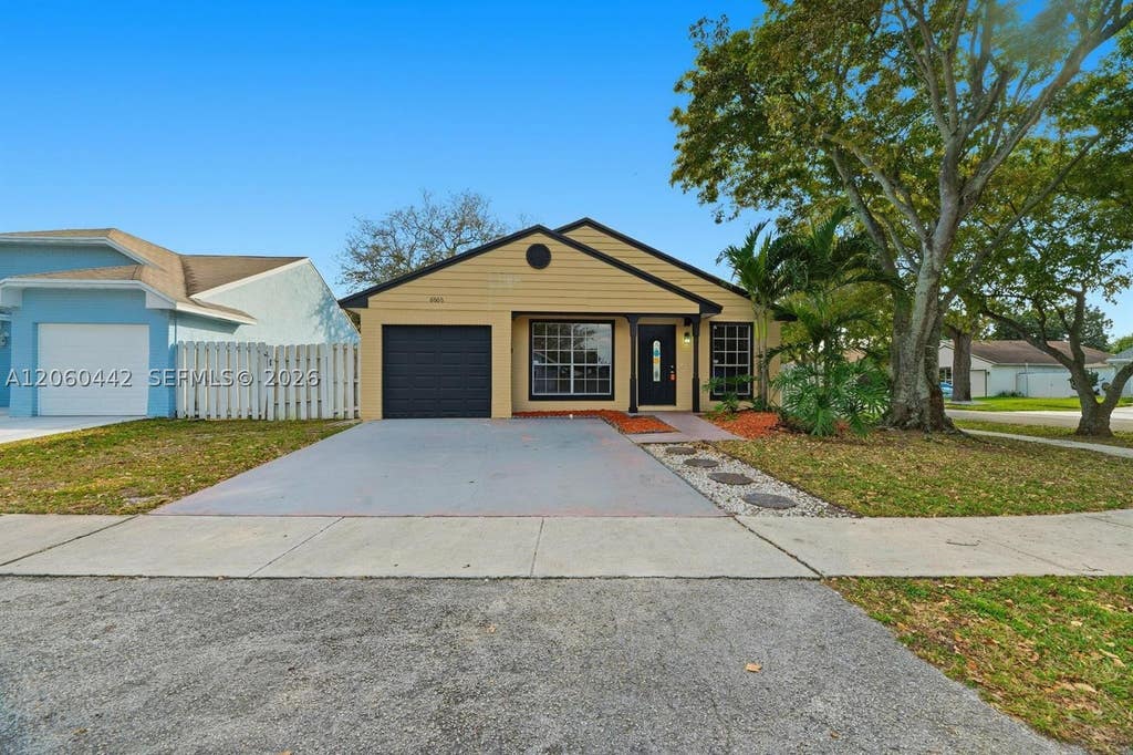 Photo of 8666 SW 14th St, Pembroke Pines, FL 33025 (MLS # A12060442)