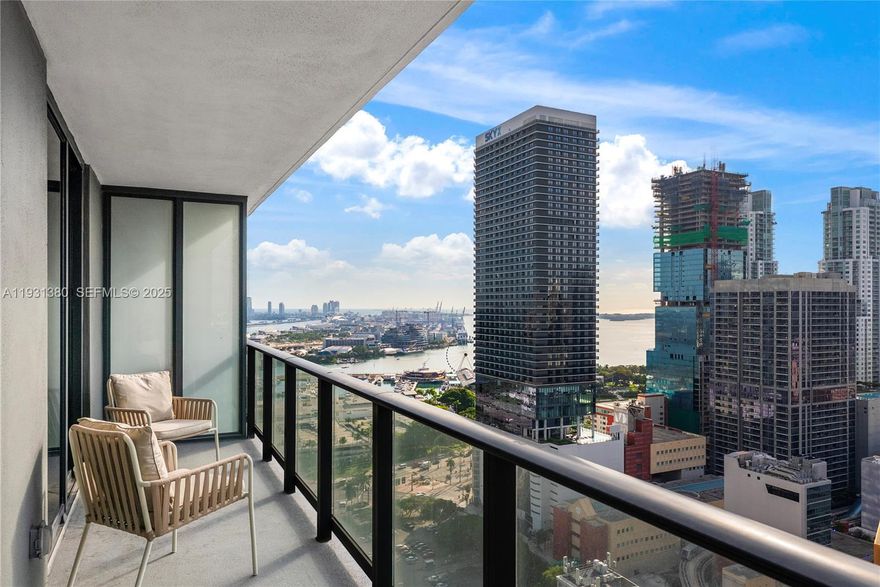 Luxury Living Above It All! This chic, nearly brand-new 1BD/1BA residence at Miami Worldcenter offers elevated city living with sun-filled interiors and expansive bay, water, and skyline views. A spacious balcony spanning the full length of the unit seamlessly extends the living space outdoors, perfect for morning coffee or evening sunsets. Inside, the residence features a sleek, modern design, an open layout, and the convenience of an in-unit washer and dryer—delivering true turnkey luxury in the heart of Downtown Miami.

Residents enjoy a full suite of resort-style amenities, including a state-of-the-art fitness center, spa and wellness facilities, resort pool with sun deck, resident lounges, coworking spaces, and 24-hour concierge and security. Located within the vibrant Miami Worldcenter district, you’re steps from top dining, shopping, entertainment, and cultural destinations, with easy access to Brightline, major highways, and Miami International Airport. Live at the center of it all—where luxury, convenience, and lifestyle come together.