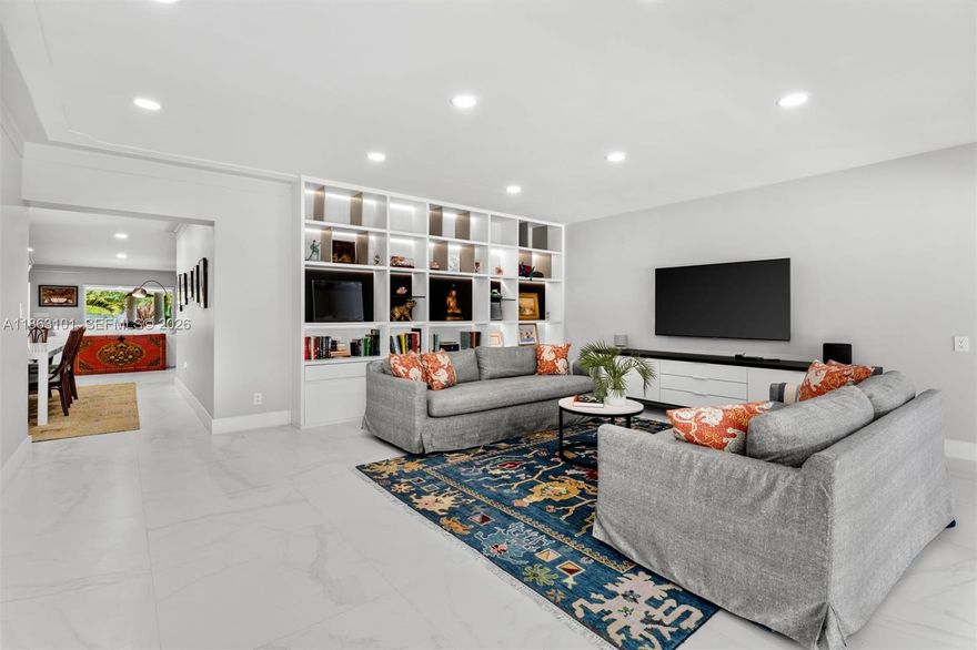 This charming waterfront gem sits on guard-gated Biscayne Point—perfectly situated just minutes from the beach, restaurants and shops of the world class Bal Harbour. Thoughtfully renovated with impact windows, new roof, updated kitchen and baths, lush landscaping, pool and dock. A flexible additional space ideal for a home office, gym, or potential fourth bedroom. A serene retreat with modern comfort and timeless charm in one of Miami Beach’s most desirable neighborhoods.