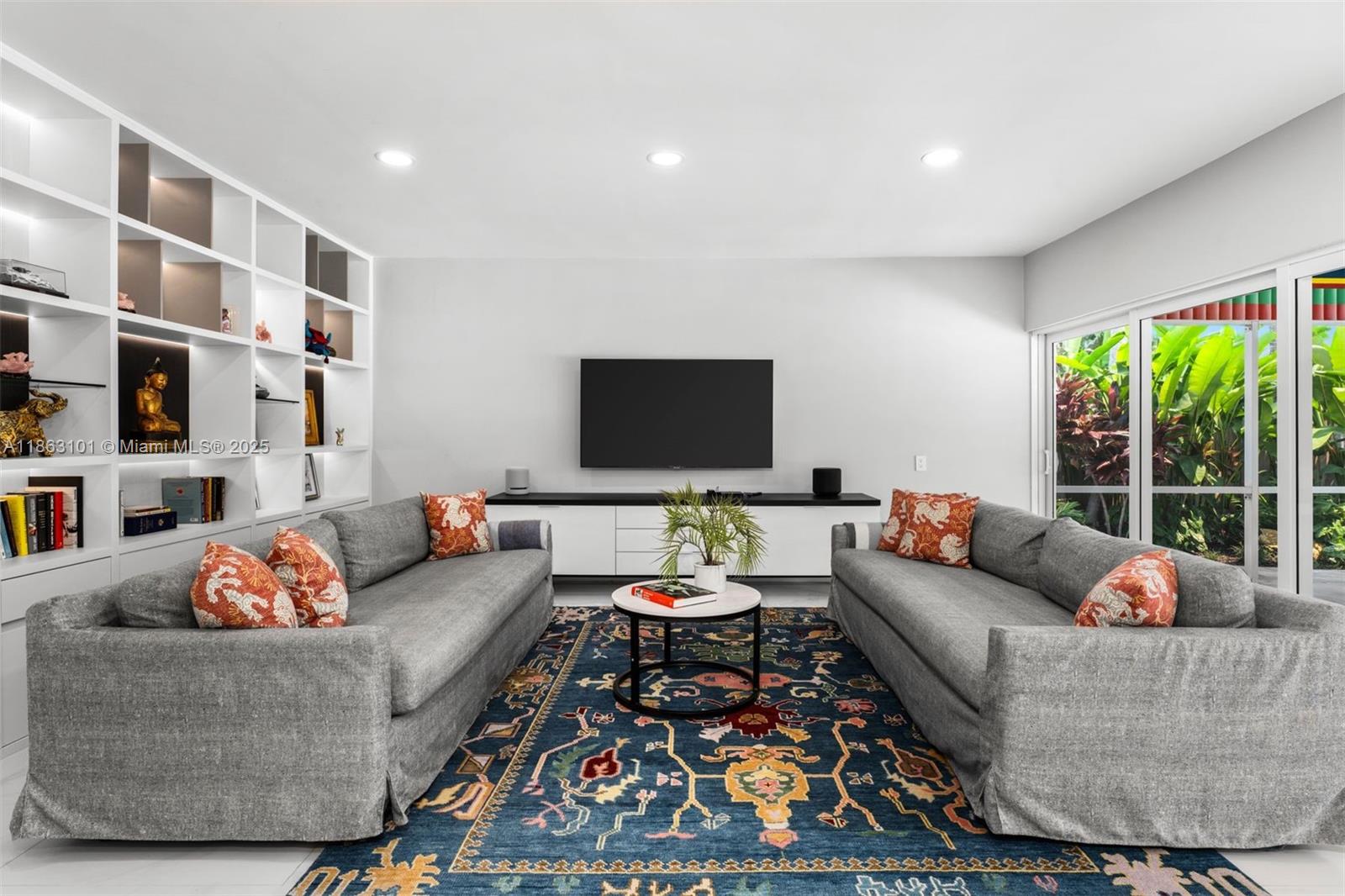 This charming waterfront gem sits on guard-gated Biscayne Point—perfectly situated just minutes from the beach, restaurants and shops of the world class Bal Harbour. Thoughtfully renovated with impact windows, new roof, updated kitchen and baths, lush landscaping, pool and dock. A flexible additional space ideal for a home office, gym, or potential fourth bedroom. A serene retreat with modern comfort and timeless charm in one of Miami Beach’s most desirable neighborhoods.