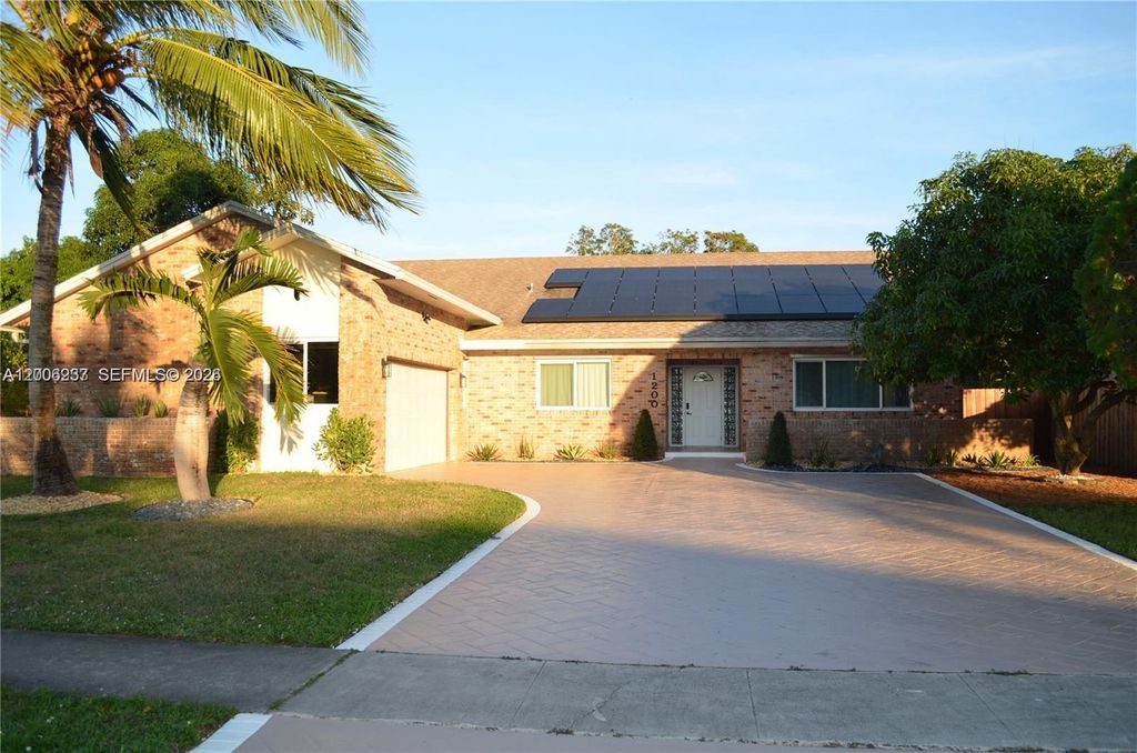 Photo of 1200 NW 78th Ave, Plantation, FL 33322 (MLS # A12006237)