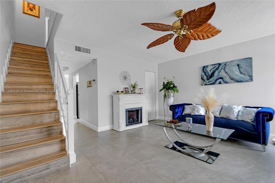 An updated and move-in ready corner townhouse in the gated community of Heritage Square of Palmetto Bay. Features include a formal living room entrance, leading to an updated kitchen with granite counters and shaker style cabinets overlooking a family and dining area. Half bathroom on the first floor with new tile flooring and a patio area for outdoor seating. New laminate flooring fulfills the second floor along with Two bedrooms with private balconies and washer/dryer. Redone less than three years ago, including PVC plumbing and a newer A/C unit. Two designated parking spaces within a community that includes a pool and tennis court and is located just blocks away from shops and restaurants like Miami favorite Maxwell's Pizza and Palmetto Bay Park. Easy to show! HOA has reserves.