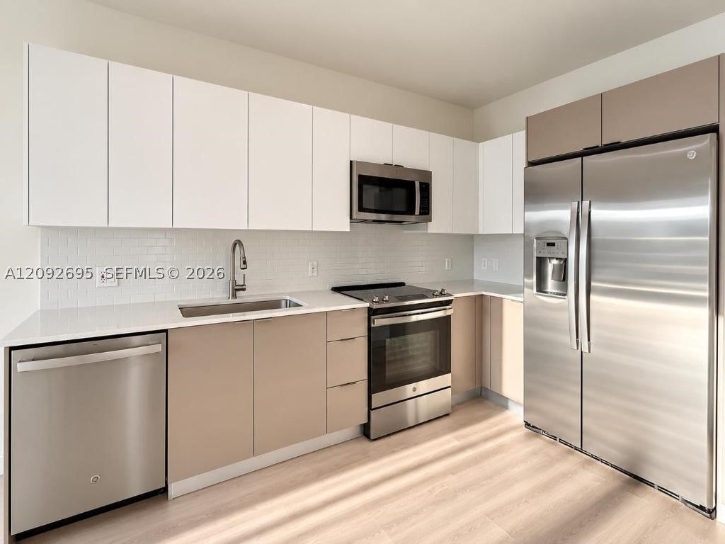 Photo of 501 N Dixie Hwy #B207, Hallandale Beach, FL 33009 (MLS # A12092695)