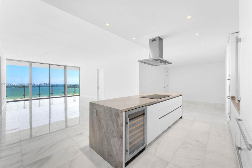 Experience unparalleled luxury living in the heart of Edgewater with unobstructed bay views at the new Missoni building. This exquisite 2-bedroom unit boasts a den that can easily be transformed into a third bedroom complete with a closet and full bath. Beyond its spacious layout, enjoy the convenience of a private elevator entrance, world-class amenities, large laundry room, and in-unit storage.Coveted unit featuring a generous 2,347 SF of interior space, complemented by a sizable balcony, totaling an impressive 2,935 SF. Buyer to receive credit for custom closet installations and den conversion for potential 3rd bedroom. Step out onto expansive balconies to soak in the breathtaking vistas and elevate your lifestyle to new heights. Easy to show call Monica for all showing appointments.