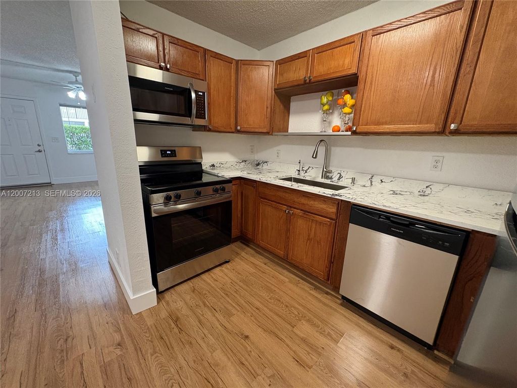 Photo of 3251 NW 102nd Ter #3251, Coral Springs, FL 33065 (MLS # A12007213)