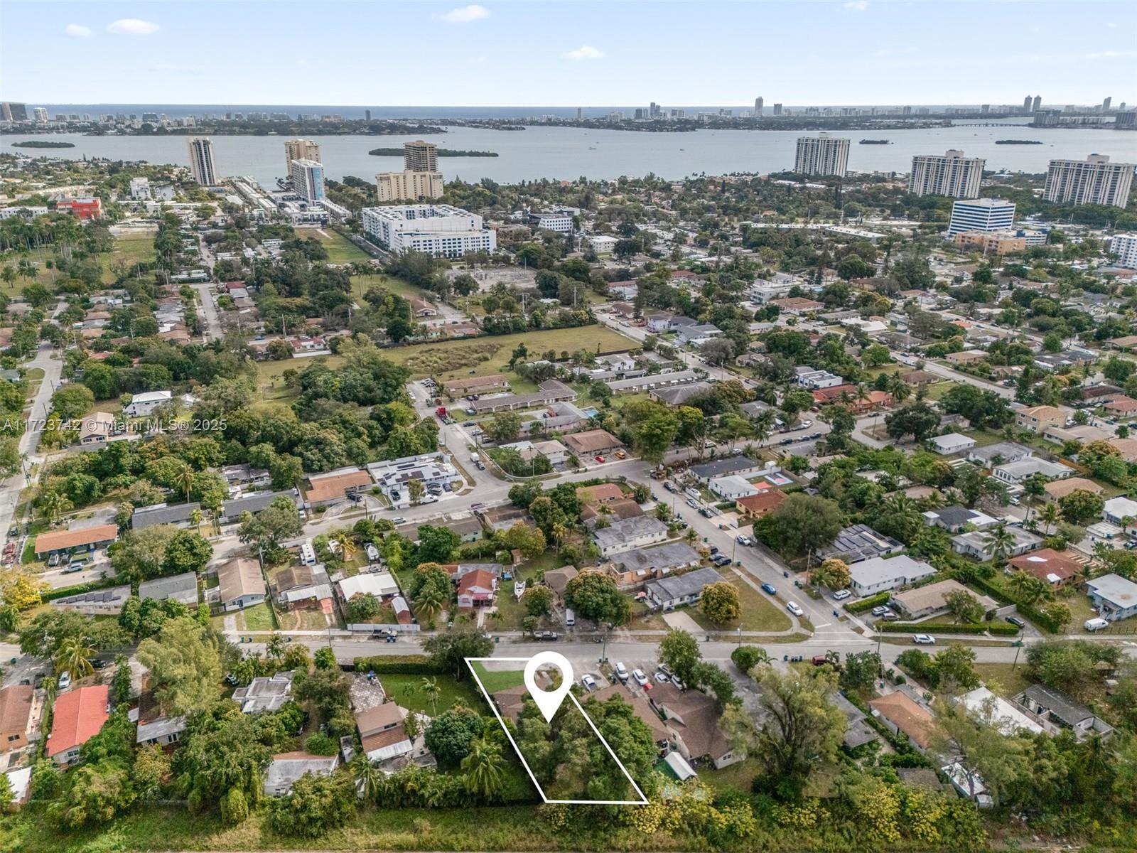 Prime Investment Opportunity in North Miami! This income producing triplex is a standout! Ideally located right between Miami Shores and Biscayne Park, in a high growth area with significant city investment planned over the next few years. The property features a 2021 roof, updated kitchens and bathrooms, durable vinyl flooring, and modern appliances. Currently rented to long-term tenants, this property delivers a strong cap rate. Seller is willing to contribute towards the buyer’s closing costs or offer a rate buy down with a strong offer. Don’t miss this chance to capitalize on North Miami’s growth potential!