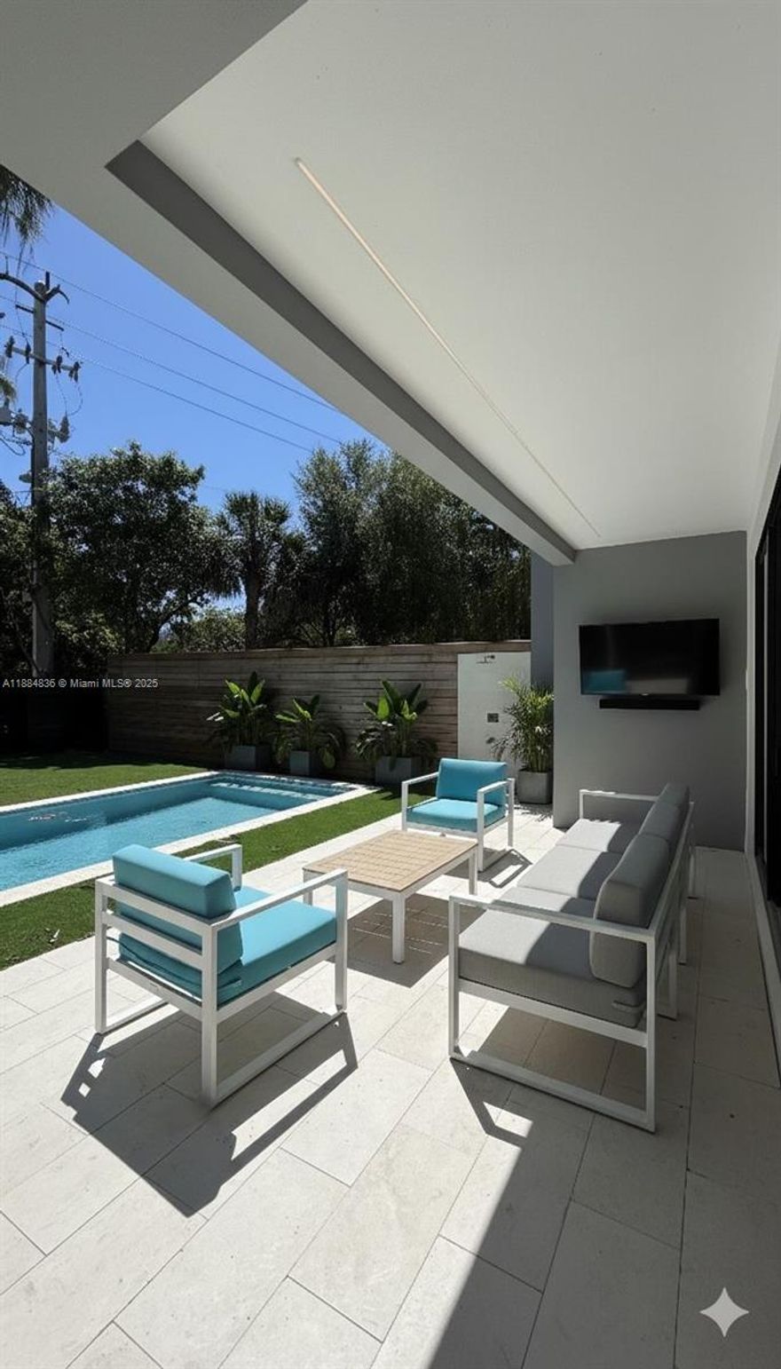 Stunning brand-new three-story residence in the heart of Shenandoah offering over 3,200 sq. ft. of contemporary design. This 4-bedroom, 4.5-bath home features soaring ceilings, a sleek chef’s kitchen with large island, quartz counters, and custom cabinetry. Dramatic floating staircase leads to spacious bedrooms with walk-in closets and a luxurious primary suite. Outdoor living includes a private pool, covered patio, and a beautifully turfed rooftop deck with skyline views. Quality finishes throughout: impact glass, porcelain flooring, and attached garage with additional parking. No HOA. Just minutes from Brickell, Coconut Grove, Coral Gables, and Key Biscayne. Adjacent twin residence at 3737 SW 3rd Ave also available.