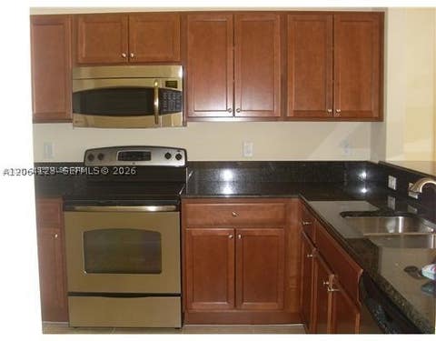 Photo of 11501 NW 89th St #105, Doral, FL 33178 (MLS # A12064123)