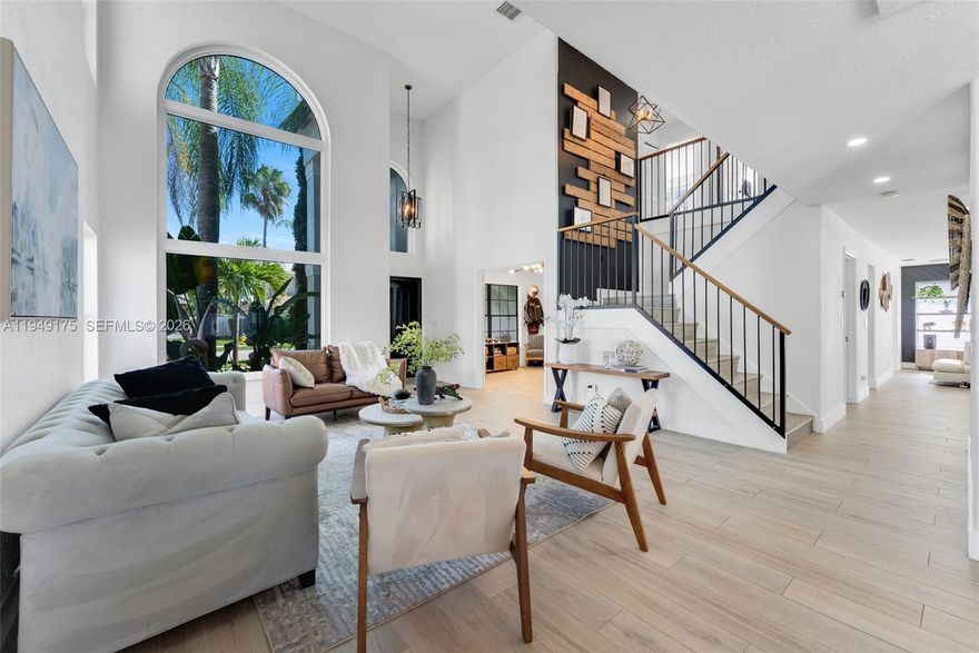 Beautifully remodeled 5-bedroom, 3-bath home in a gated community, featuring thoughtful design throughout. New roof and impact windows. Ideally located near grocery stores, and community parks, offering both convenience and an exceptional lifestyle. A must-see!