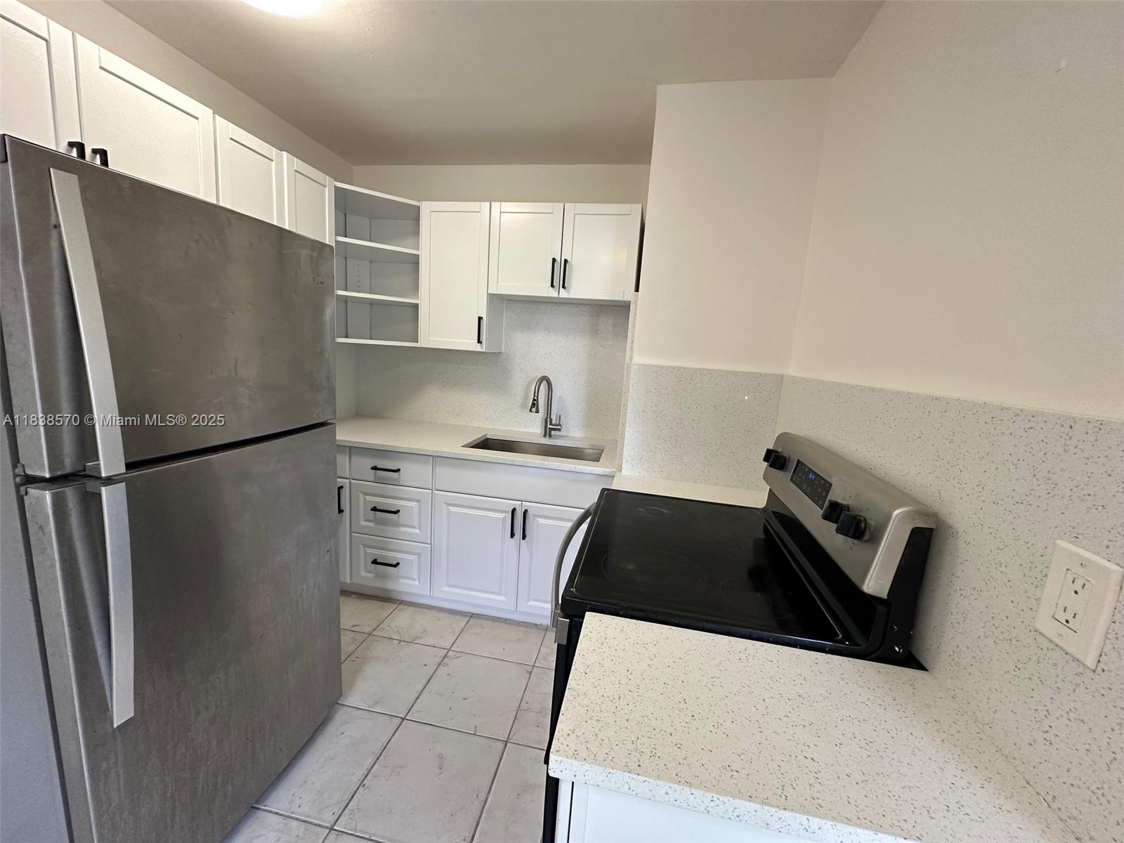 717 NW 5th Ave 1-2