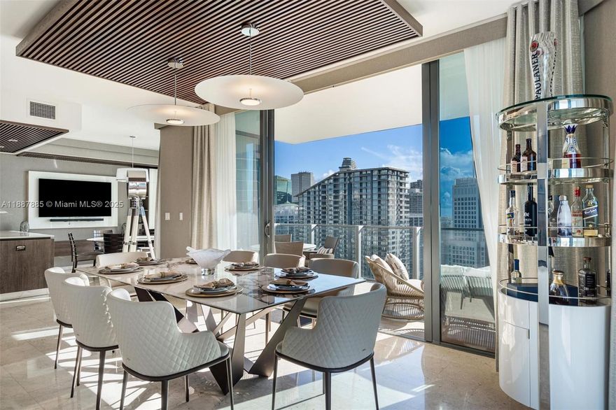 Unmatched value in Brickell! This expansive 4 Bedrooms 4.5 Bathrooms corner home at Rise, Brickell City Centre delivers sweeping water and city panoramas from oversized wraparound terraces. Designed for both style and function, interiors feature marble flooring, custom Italian cabinetry, quartz island kitchen, sleek floating vanities, and automated shades. Each bedroom is complete with generous walk-in closets, plus a large laundry room and private staff quarters with full bath. Two assigned spaces and guest valet parking add convenience. Located above Brickell’s premier destination for luxury shopping and dining, this residence combines world-class amenities with the ultimate Miami lifestyle—offered at the most competitive price for a 4-bedroom in the building.