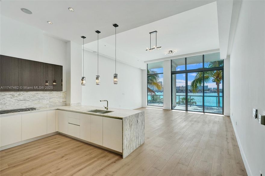Stunning Renovated Lanai Residence at Echo Aventura. This 3-bedroom + den, converted into 4 bedrooms + maid’s quarters lanai residence has been newly renovated with brand-new flooring and offers 2,980 SF of interior space plus a 635 SF waterfront terrace with a summer kitchen. Enjoy direct Intracoastal views from this 12-foot ceiling home with floor-to-ceiling windows and seamless indoor-outdoor living. The gourmet kitchen boasts Italian cabinetry, Wolf & Sub-Zero appliances, and a midnight bar. The expansive primary suite features a custom wardrobe and spa-like bath. Echo Aventura offers 5-star amenities, including a Bayfront pool, fitness center, concierge, and valet.