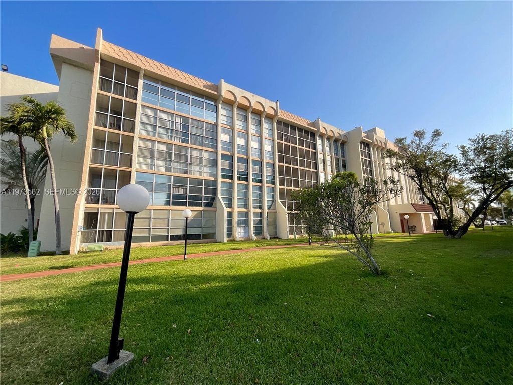 Photo of 851 Three Islands Blvd #206, Hallandale Beach, FL 33009 (MLS # A11973562)