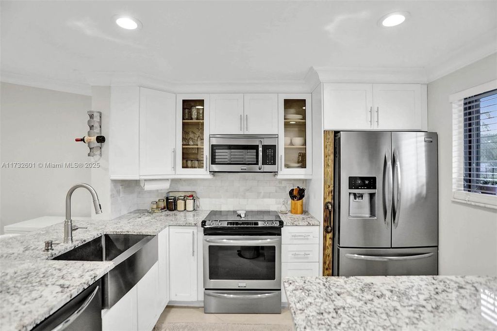 Photo of 9395 Boca Cove Cir #1208, Boca Raton, FL 33428 (MLS # A11732601)