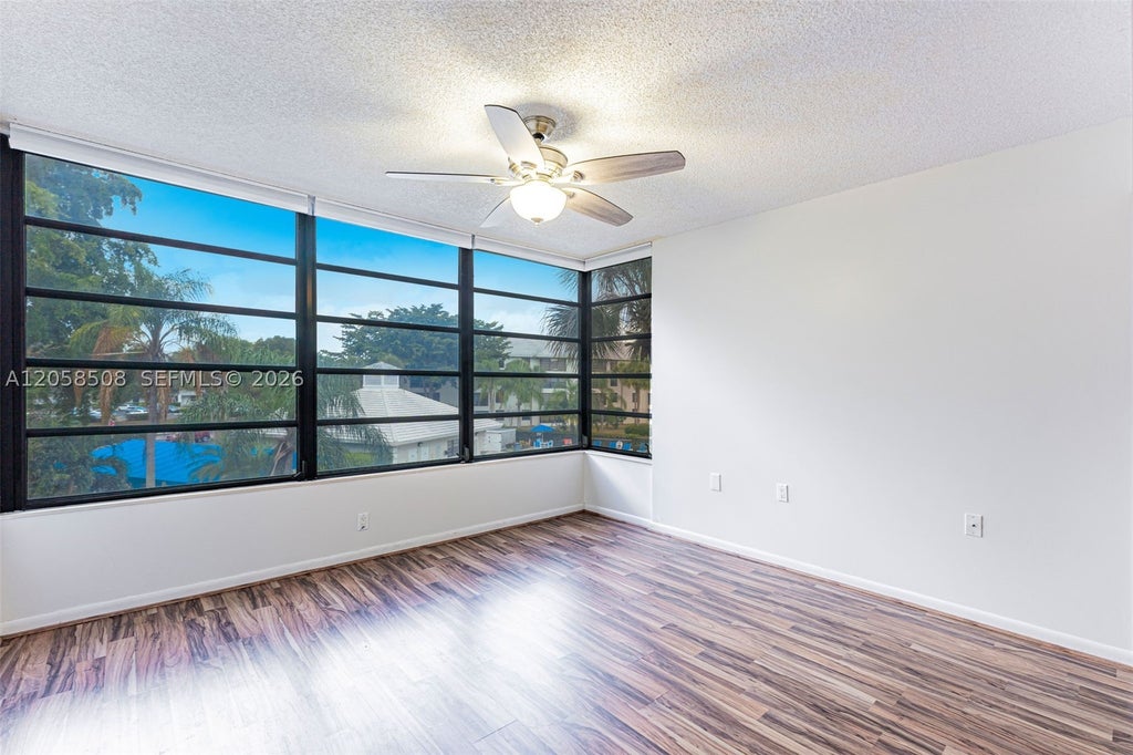 Photo of 1719 Whitehall Dr #304, Davie, FL 33324 (MLS # A12058508)