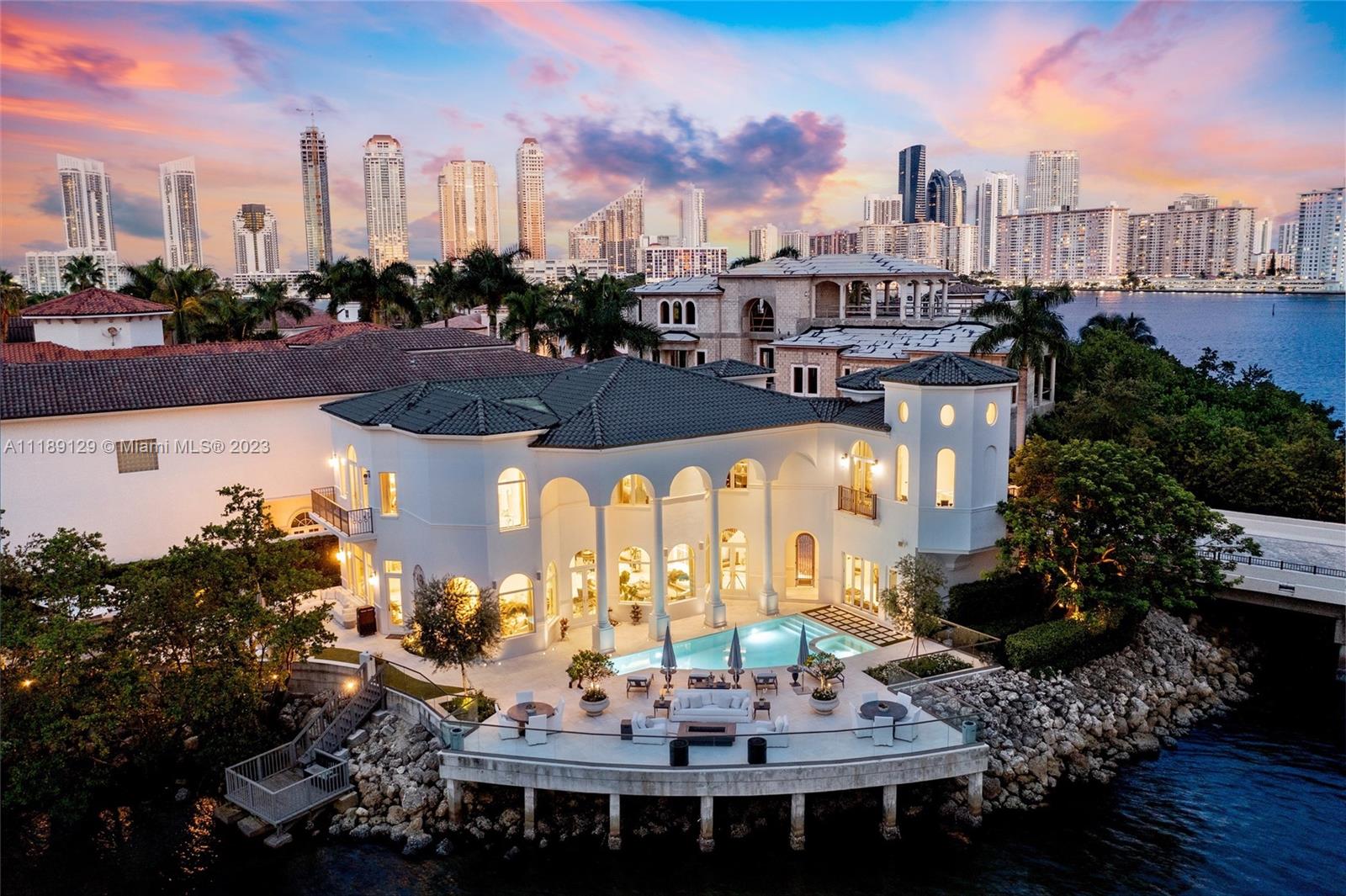 Take a breath of fresh air as you walk into your new home nestled in the prestigious Island Estates. This modern-day smart house provides a heavenly feeling the moment you step through the front doors and the crisp intracoastal views take over. The home boasts 5 bedrooms, 5 bathrooms, 1 powder room, along with an additional converted room. Designed by the one and only Ramon Pacheco, the home features Ornare kitchens and closets, Waterworks tub, Ann Sachs and Water Works vanities, 2 Toto toilets, Samuel Health fixtures throughout, custom bbq area and more.