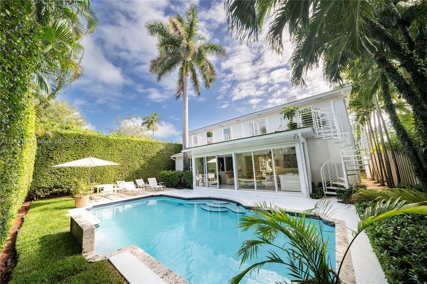 Glamorous Art Deco beauty on prestigious Pine Tree Dr. This is the perfect home for entertaining! Enter into courtyard through the walled & electric gated entrance w/2-car garage & plenty of parking. This remodeled home offers indoor/outdoor living w/magical natural light throughout leading to the lushly landscaped private backyard w/pool & lounge. 2B/2BA UP w/primary suite opening to huge terrace w/staircase leading to backyard. 1B/2BA + den DOWN w/gas gourmet kitchen & upgraded finishes.