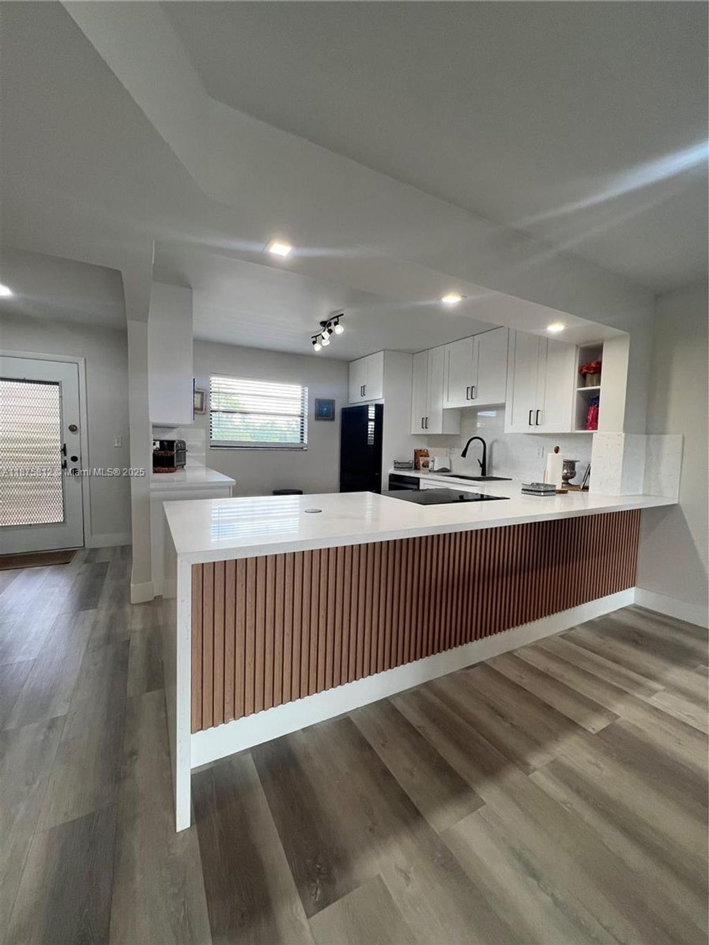 Photo of 4950 E Sabal Palm Blvd #407, Tamarac, FL 33319 (MLS # A11875812)