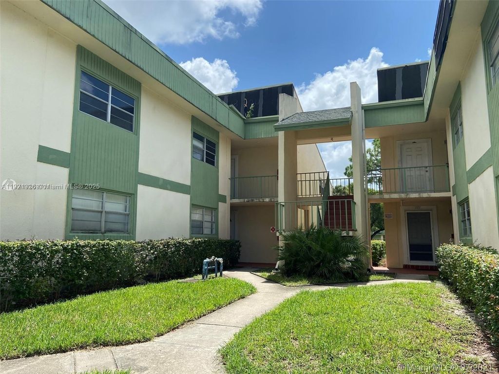 Photo of 4133 NW 88th Ave #204, Coral Springs, FL 33065 (MLS # A11921926)