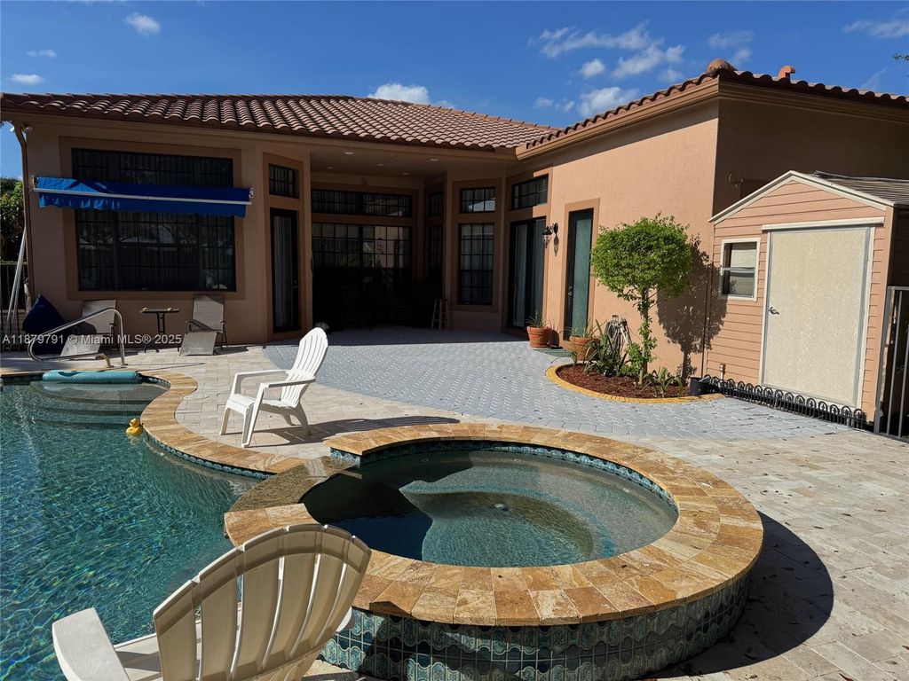 Photo of 3445 NW 87th Ave, Cooper City, FL 33024 (MLS # A11879791)