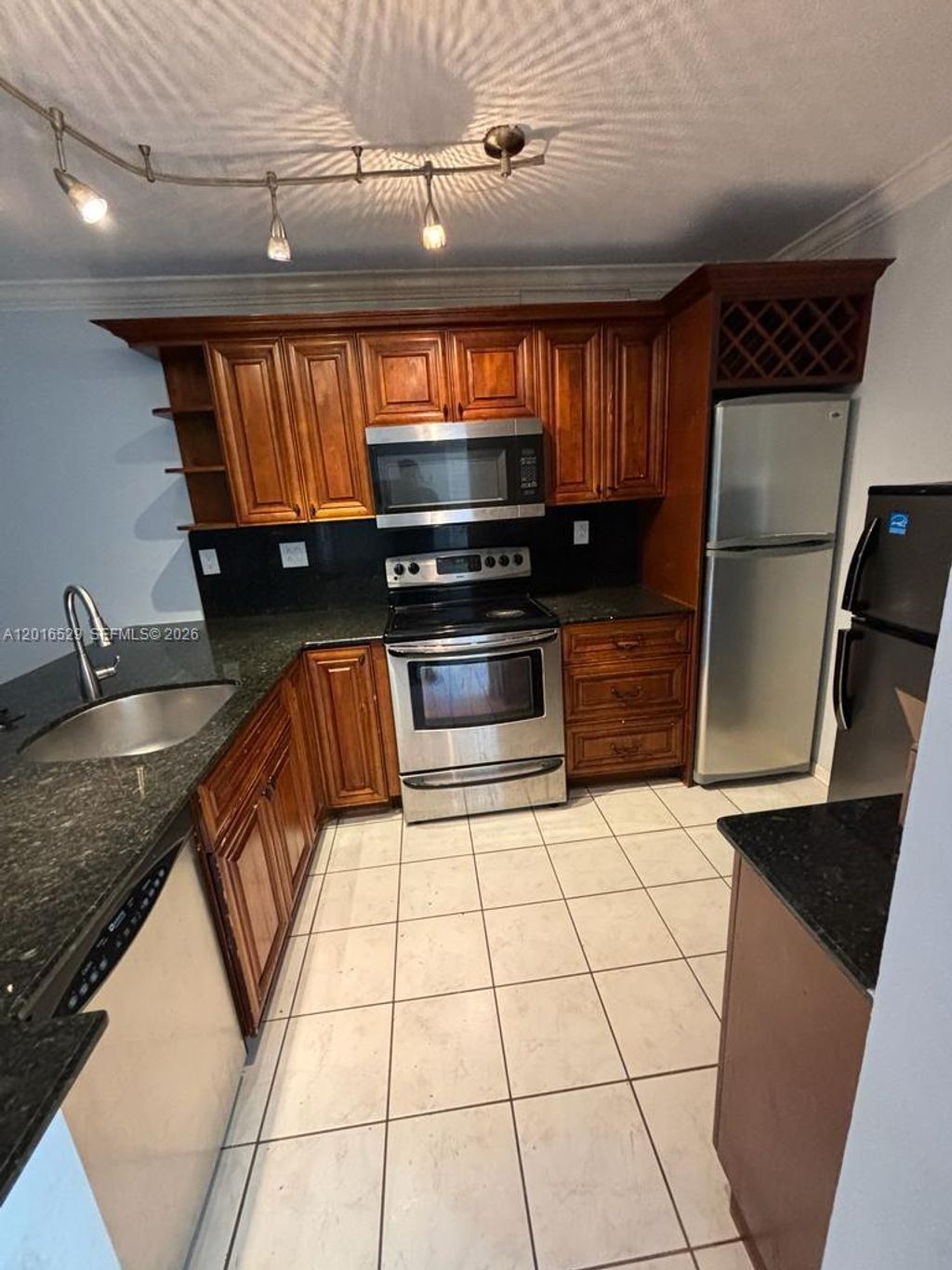 Photo of 10329 NW 11th St #201, Pembroke Pines, FL 33026 (MLS # A12016529)