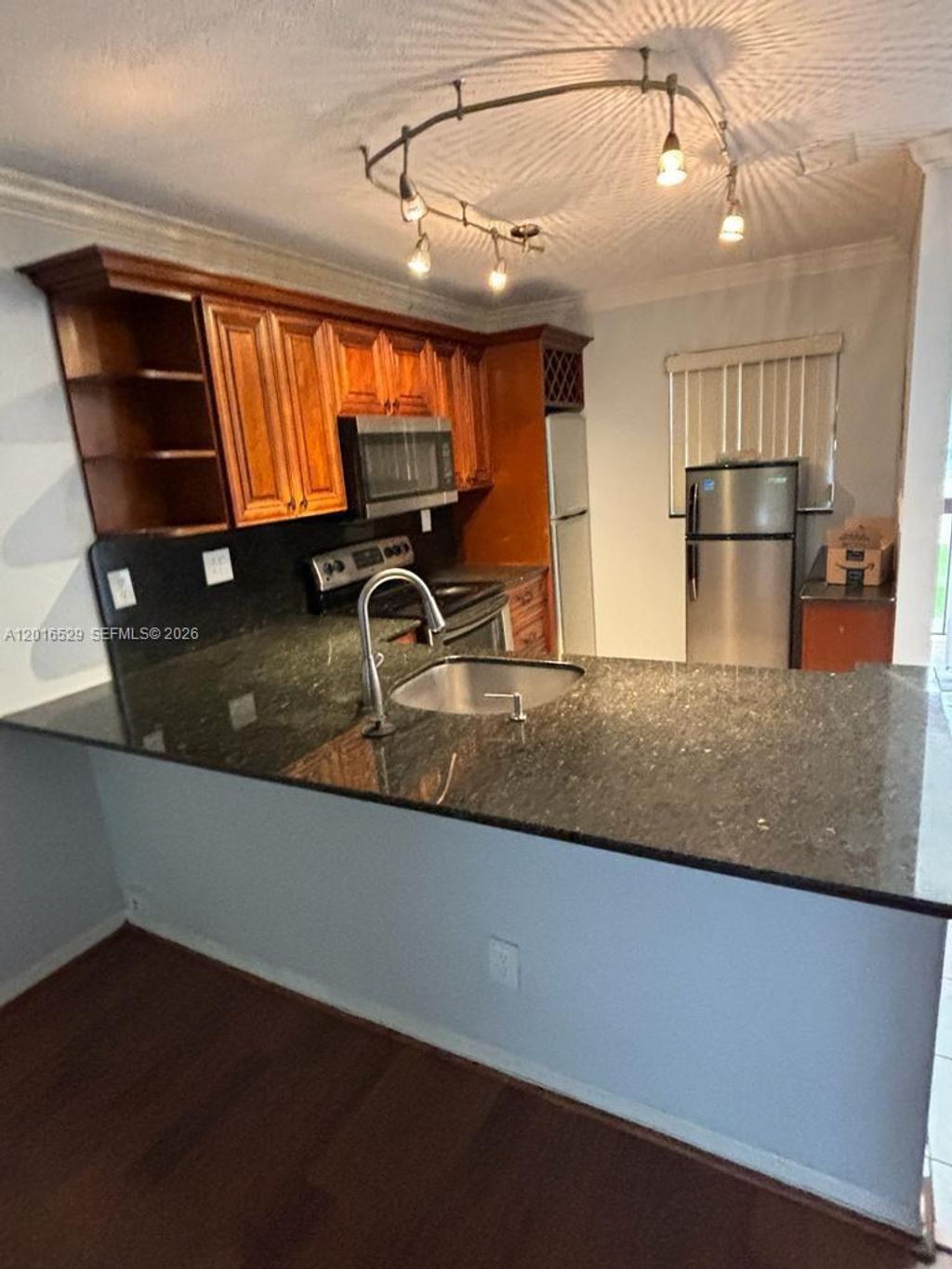 Photo of 10329 NW 11th St #201, Pembroke Pines, FL 33026 (MLS # A12016529)