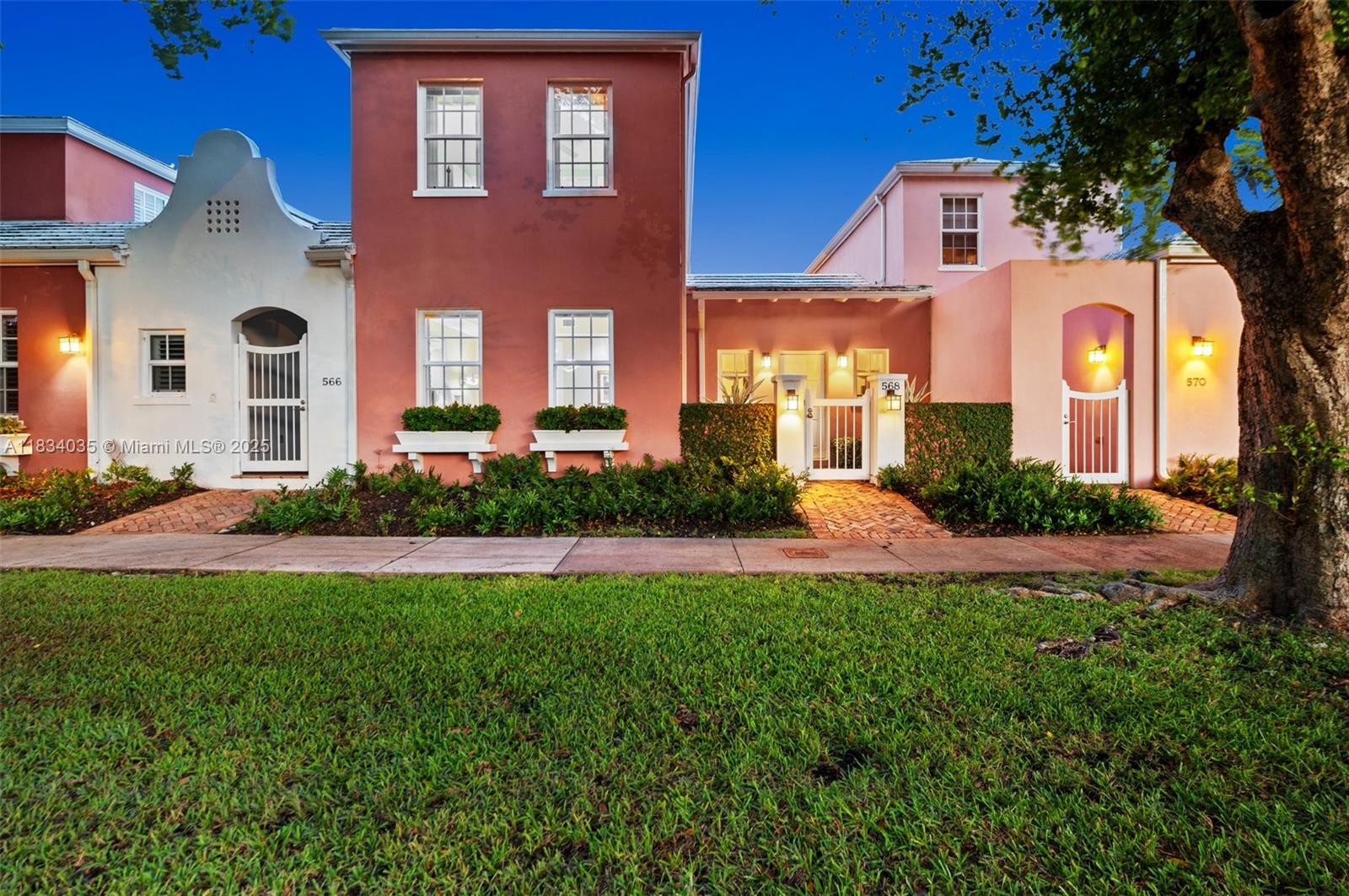 Charming Bermuda Village created in the spirit of the exotic 1920s Gables residential enclaves built by legendary developer George Merrick. Sculptural parapets, garden gates, storybook private courtyards, white cement roof tiles & colors ranging from light pink to dark red w/white accents recall early Bermudan architecture, dressing the community in an enchanting Caribbean character. Completely redesigned, 568 Loretto is a showcase of elegant comfort. The bounty of customization can only be hinted at by highlights such as crown moldings, designer lighting & millwork throughout, built-in library w/hidden kitchen pass-thru & secret exit, add-on closets & custom window treatments. The heart of the village harbors a pool framed by a pergola & Bermudan-style cabana. 2CG. Impact doors/windows.