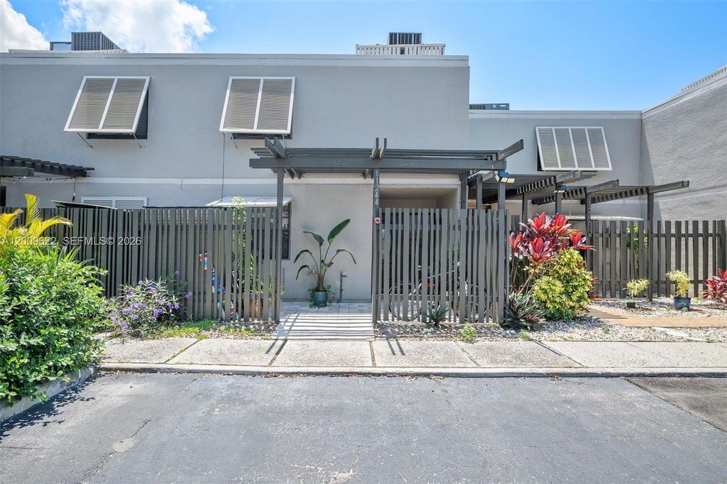 Photo of 11244 NW 14th Ct, Pembroke Pines, FL 33026 (MLS # A12009622)