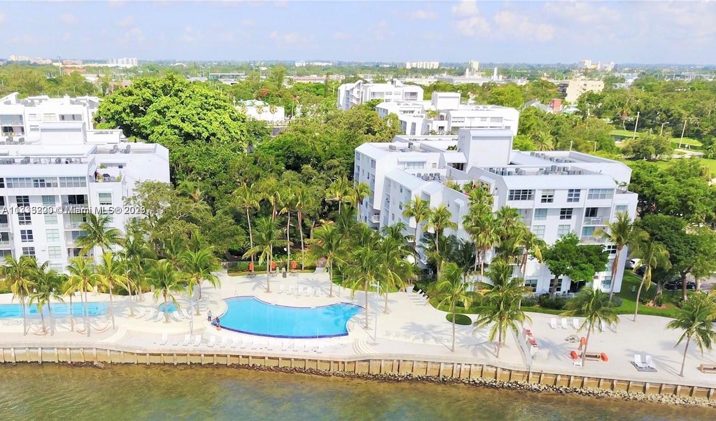 Nirvana, a waterfront community in the MIMO district on Miami's Upper East Side, close to all desired locations: Wynwood, Miami Design District, Beaches, Brickell & Downtown, & Miami Int'l Airport. This community boasts amazing amenities: Large Infinity Pool, Jacuzzi, Beach area along Biscayne Bay with Picnic area & Sand Volleyball, Kayak & Paddle Board Storage, Brick BBQ Area, Fully Equipped Gym w/Sauna, Bike Storage, Mini-Market & On-site Mngmt. This Beautiful & Impeccable 2/2 recently updated with new bath shower floor, new cabinet handles throughout bathrooms & kitchen, new A/C ducts, polished ceramic floors, fully painted walls & doors, new glazed tub in master bath & new mirrors in bathrooms. Great closet space in both extra large BR's w/convenient split floor plan. Extra LG balcony