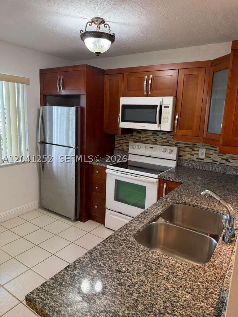 Photo of 8610 N Sherman Cir #508, Miramar, FL 33025 (MLS # A12041252)