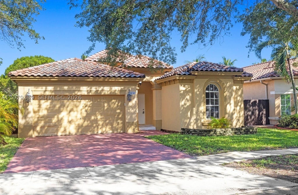 Photo of 5040 SW 139th Ter, Miramar, FL 33027 (MLS # A12079339)