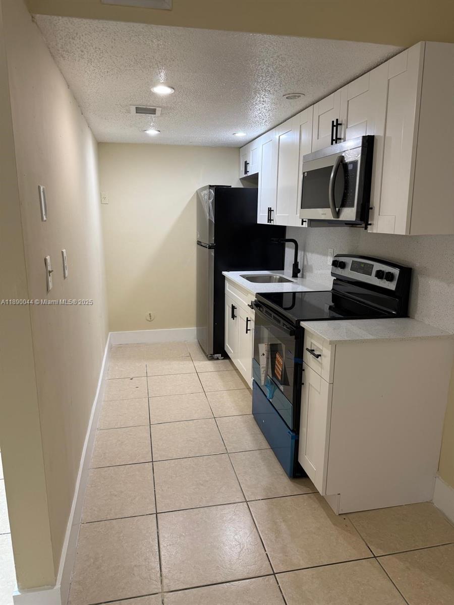 WESTLAND VILLAGE CONDO II - Residential Lease