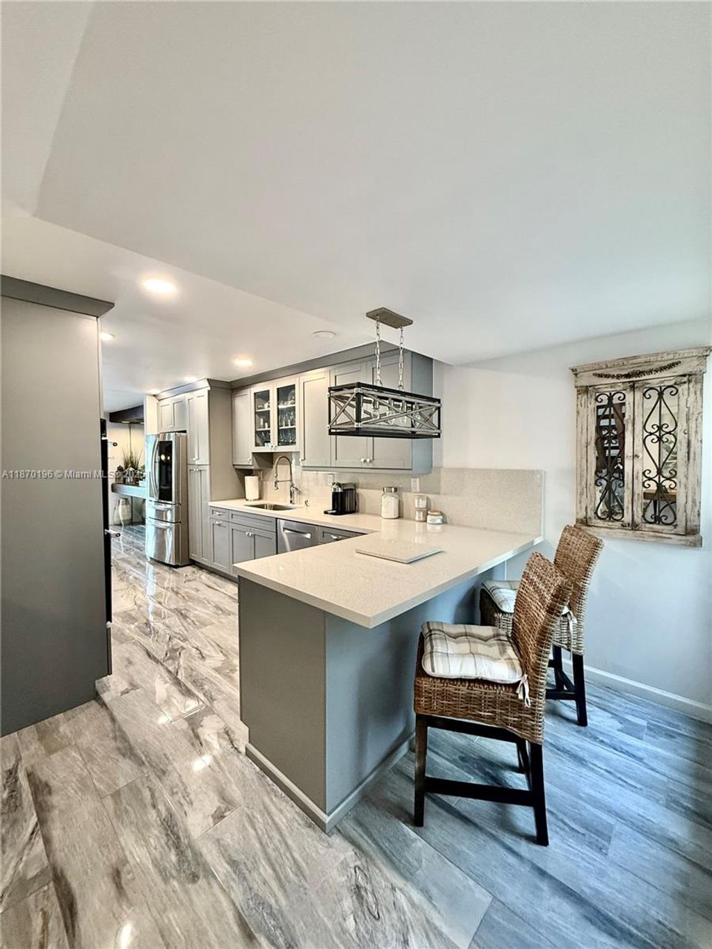 Photo of 9703 N New River Canal Rd #102, Plantation, FL 33324 (MLS # A11870196)