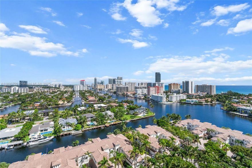 Experience stunning views that stretch from the Intracoastal Waterway to the ocean, with the Fort Lauderdale skyline in the distance. This elegant corner residence features 3 spacious bedrooms, 3 full bathrooms and a powder room, blending comfort with refined sophistication. Nestled in a prestigious community, the property embraces a true luxury resort lifestyle: three sparkling pools, tennis courts, a clubhouse with fitness center, spa, café, and a wide array of wellness and recreational activities. Residents enjoy the privacy of an exclusive enclave while being moments away from the finest dining, shopping, and cultural experiences that South Florida has to offer. An exceptional balance of elegance, leisure, and convenience in one of the region’s most desirable settings.