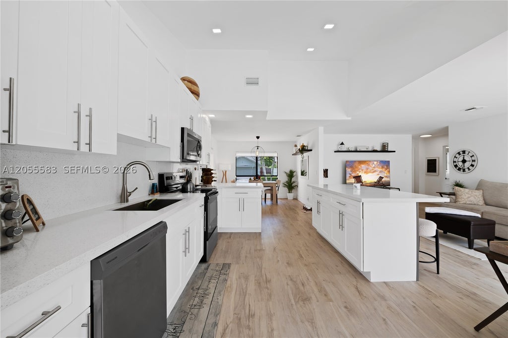 Photo of 8311 NW 51st Ct, Lauderhill, FL 33351 (MLS # A12055583)