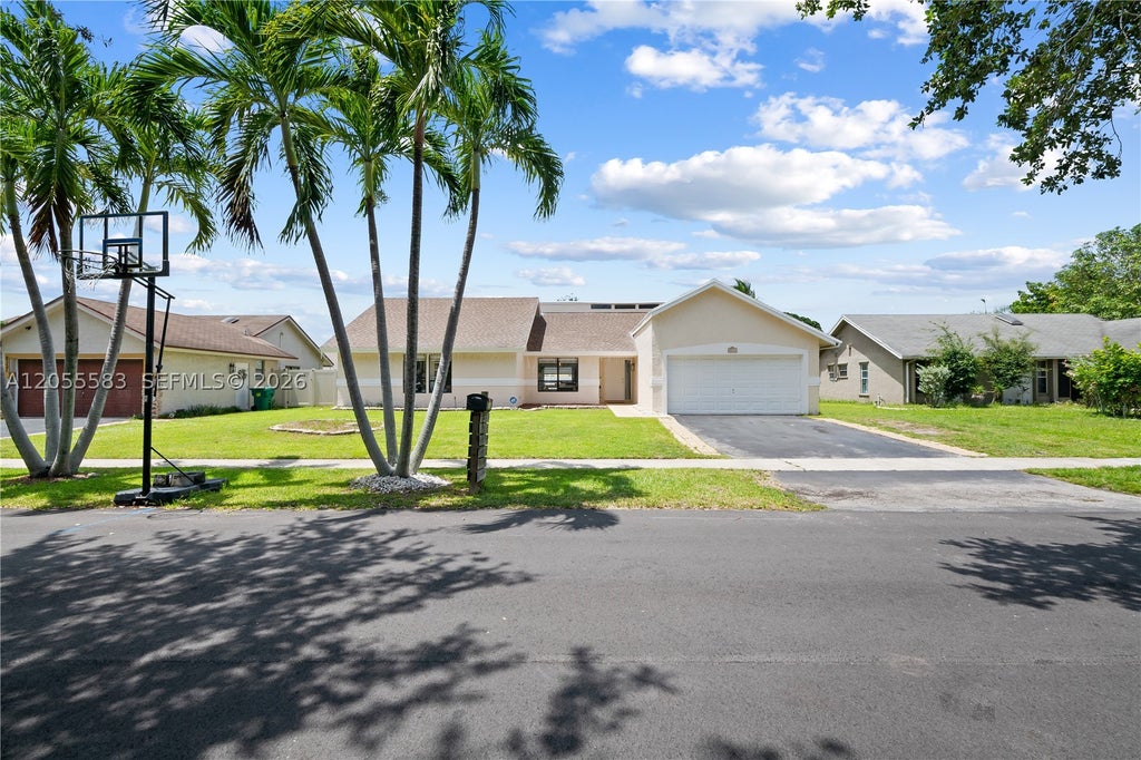 Photo of 8311 NW 51st Ct, Lauderhill, FL 33351 (MLS # A12055583)