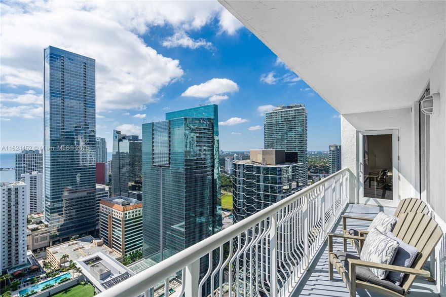 Enjoy living by the water at this gorgeous two-bedroom, two-bathroom condo in Brickell. The living, dining, and kitchen spaces are all effortlessly integrated into one open-concept space, making it a light and airy place to host or unwind. Magnificent views of the city and bay are framed by large windows, and amenities like allocated parking, in-unit laundry, and secure entry add to your comfort and convenience. This pet-friendly building has an abundance of features, such as a fitness center, a designated children's play area, glittering pools, a soothing jacuzzi, a social hall for events, and even round-the-clock valet parking for maximum convenience.