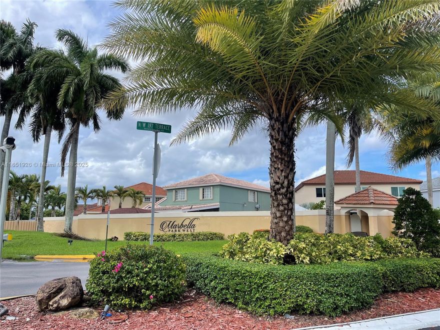 Seller willing to contribute towards buyers closing costs or contribute for interest rate reduction if it closes before year end! Wonderful corner lot home in exclusive guard gated Marbella Park community.  New roof installed in 2021 (lower insurance costs) and current low property taxes makes easier to qulaify. This split plan home features 3 br/2 baths plus converted garage which could serve as 4th bedroom or office. Enjoy a fully screened and fenced patio for outdoor entertainment. Convenient location close to highways and shopping. Down the street from Publix and Sedanos.