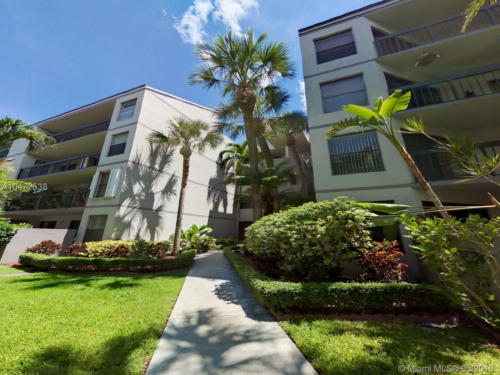 Gorgeous and LARGE 2 bedroom 2 bath condo on top floor of Calusa Club Village. Unit has updated kitchen with brand new full size washer and dryers inside the unit. Tile floors in apt. Located very close to turnpike and great restaurants. Great price for such a big apartment. Under AC is 1200 Sqft. You will not find any 2 Bedroom this big. Unit will not last call Listing Agent.