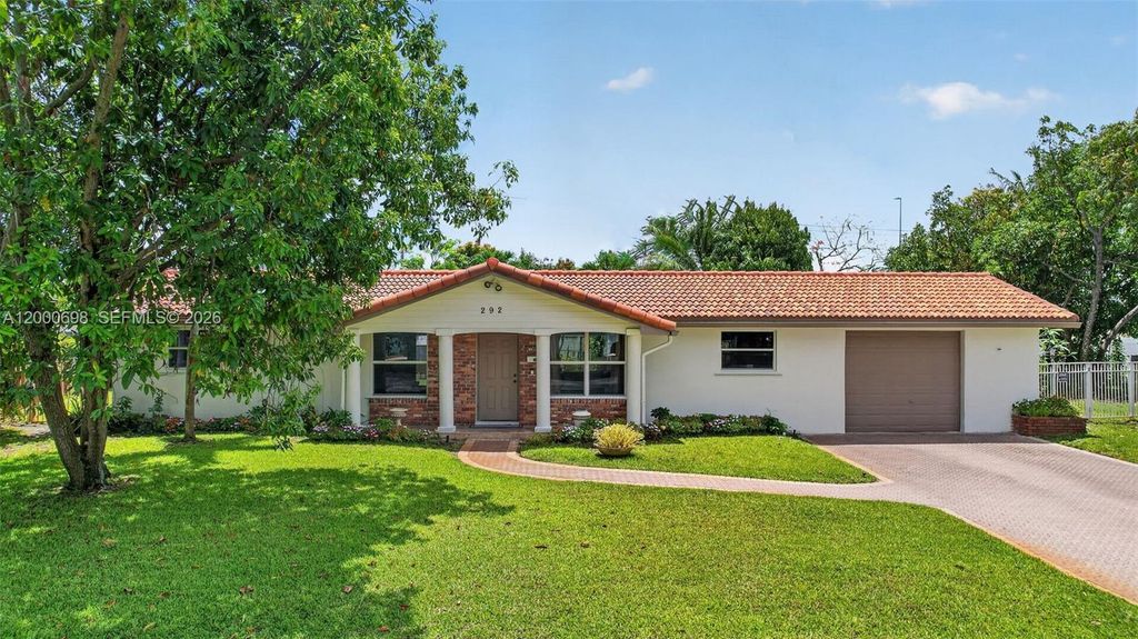 Photo of 292 SW 52nd Ave, Plantation, FL 33317 (MLS # A12000698)