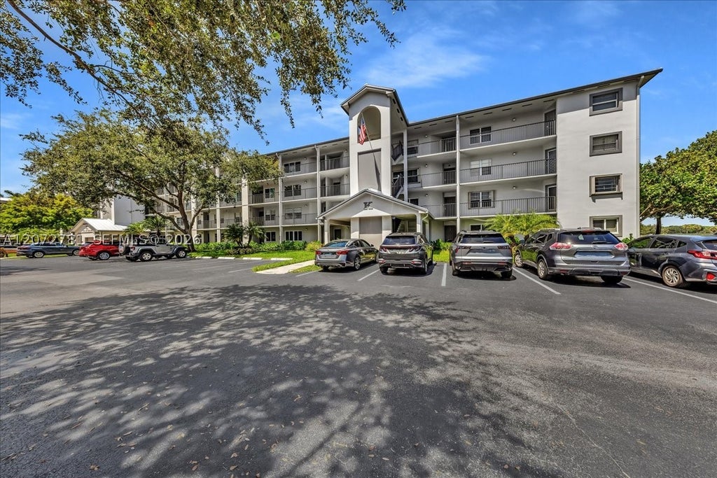 Photo of 1300 SW 125th Ave #114K, Pembroke Pines, FL 33027 (MLS # A12072781)